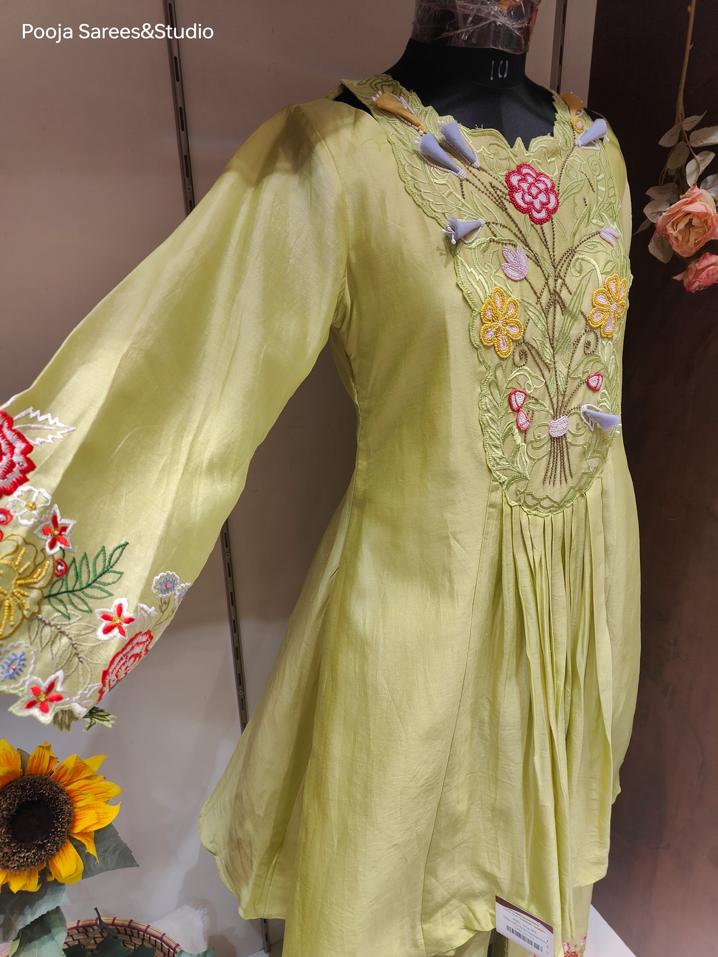 AARSAA Pista Green Raw Silk Beads , Applique Work and threadwork floral themed cordset with stylish Neck Pattern, Sleeve Pattern with Work on pants