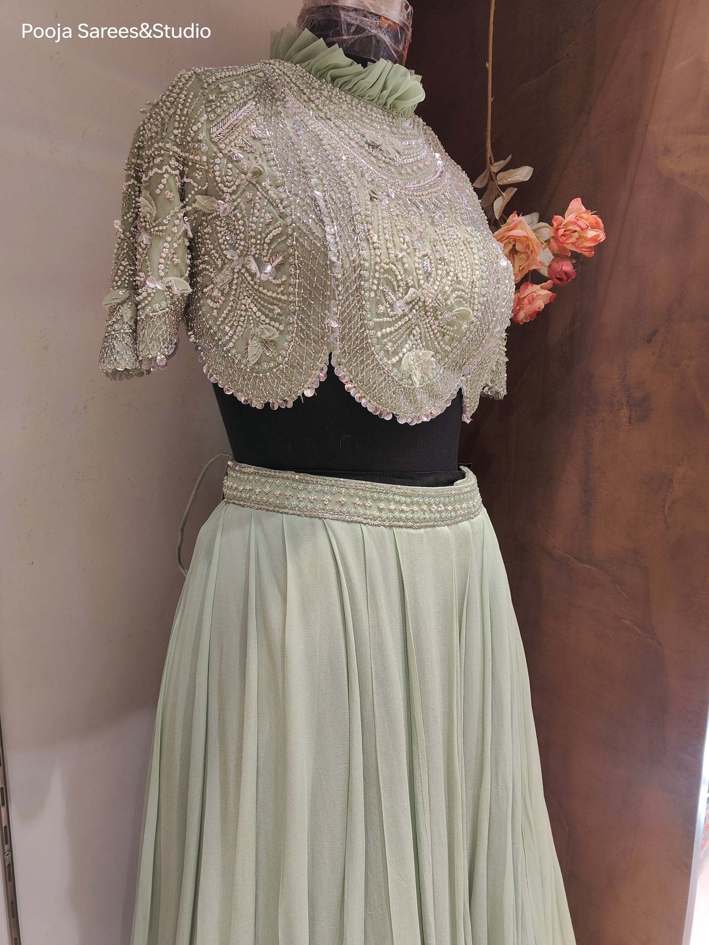 AARSAA Green Crepe Full Moti Katdana Work High Neck Scalloped Drape Blouse With Flared Skirt