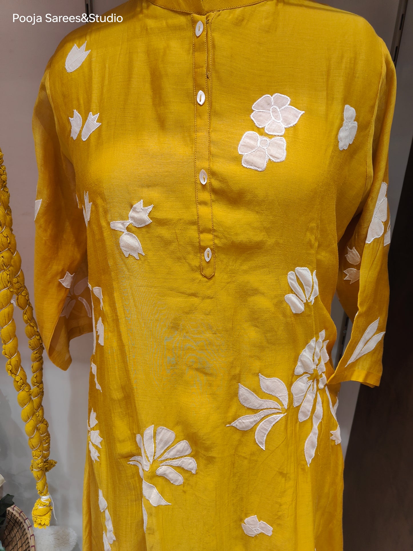 AARSAA Yellow Mulmul Cotton Applique Work Flared Kurta Set