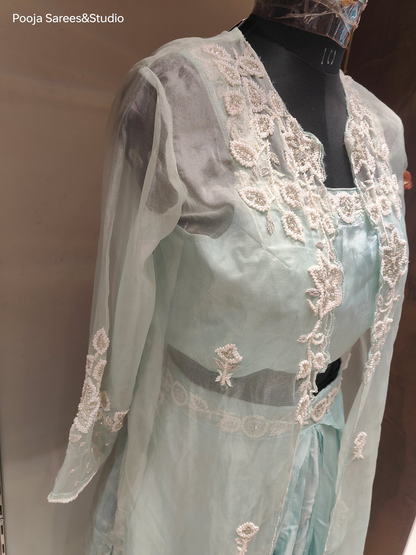 AARSAA Light Blue Organza Moti work Sleeveless blouse with full jacket and cowl skirt