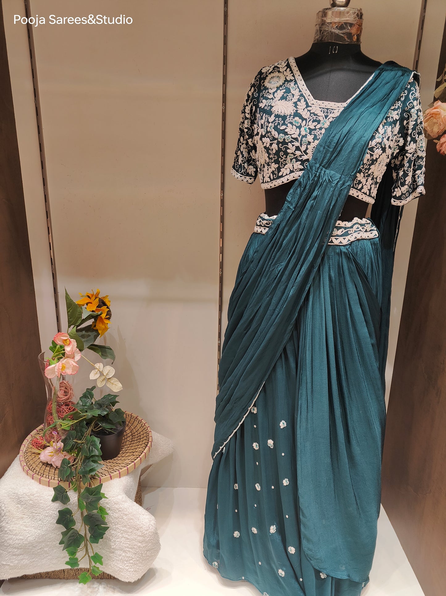 AARSAA Turquoise Crepe Moti work blouse with Flared Moti work drape lehenga