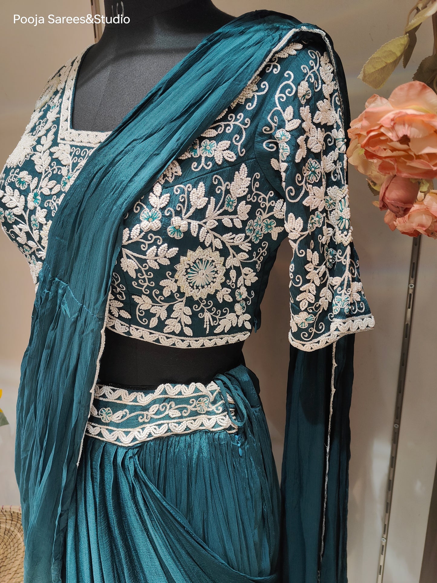 AARSAA Turquoise Crepe Moti work blouse with Flared Moti work drape lehenga