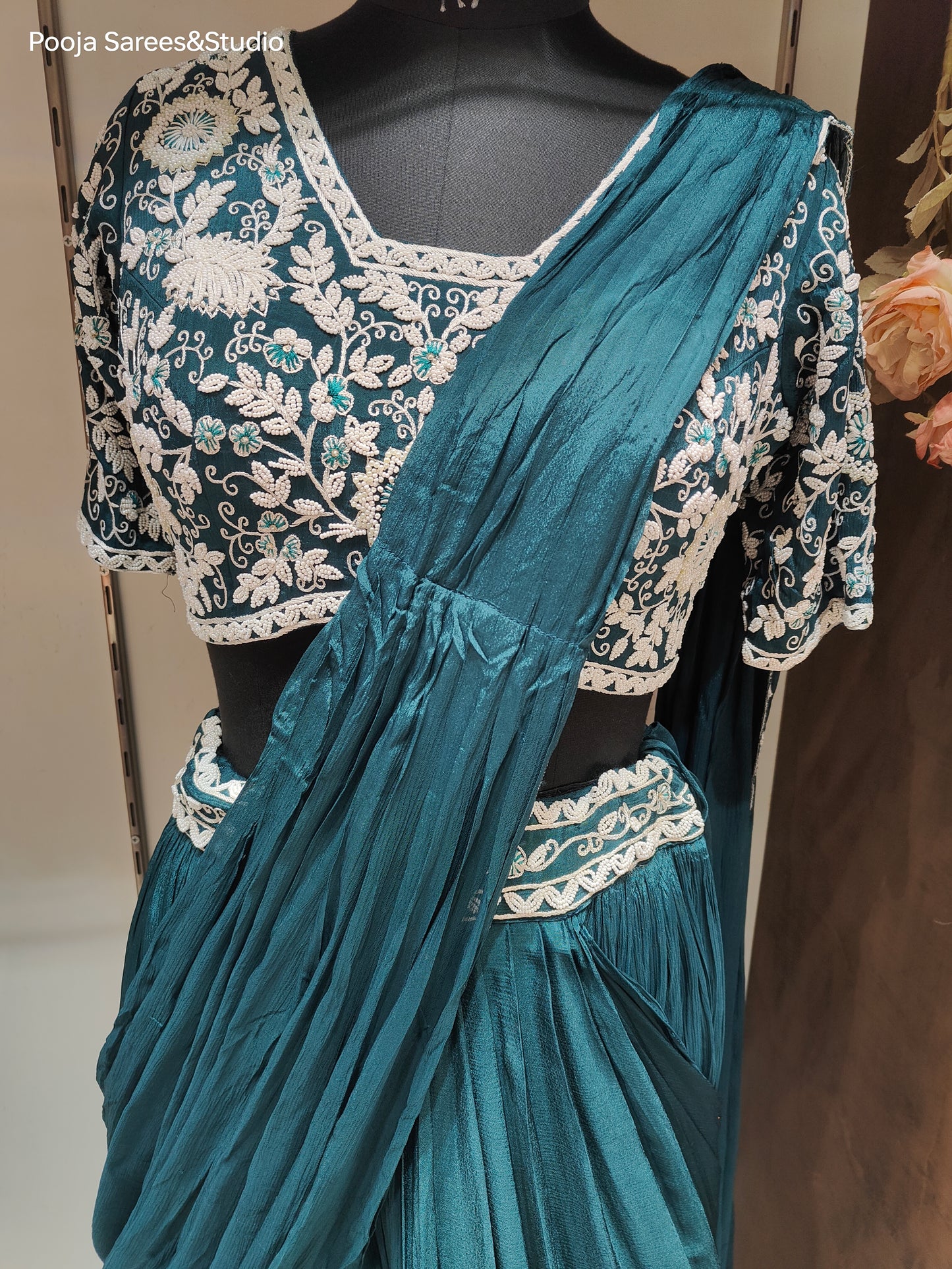 AARSAA Turquoise Crepe Moti work blouse with Flared Moti work drape lehenga