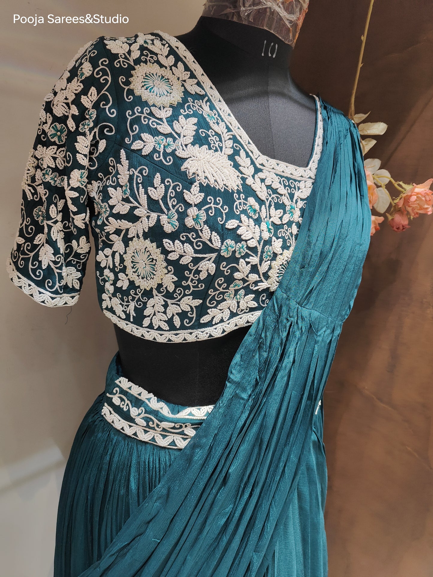 AARSAA Turquoise Crepe Moti work blouse with Flared Moti work drape lehenga