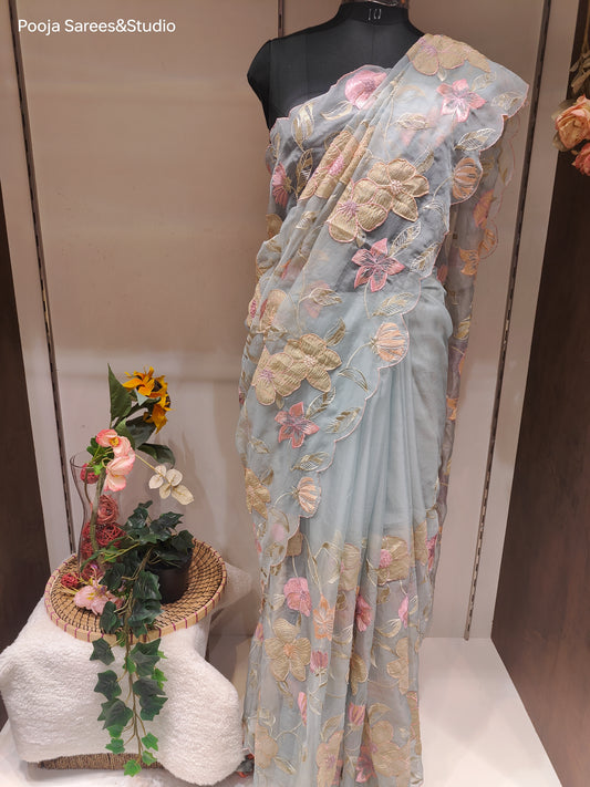 AARSAA Light Blue Organza Full Threadwork with Tissue Fabric Applique Work Saree with Plain Unstitched Blouse