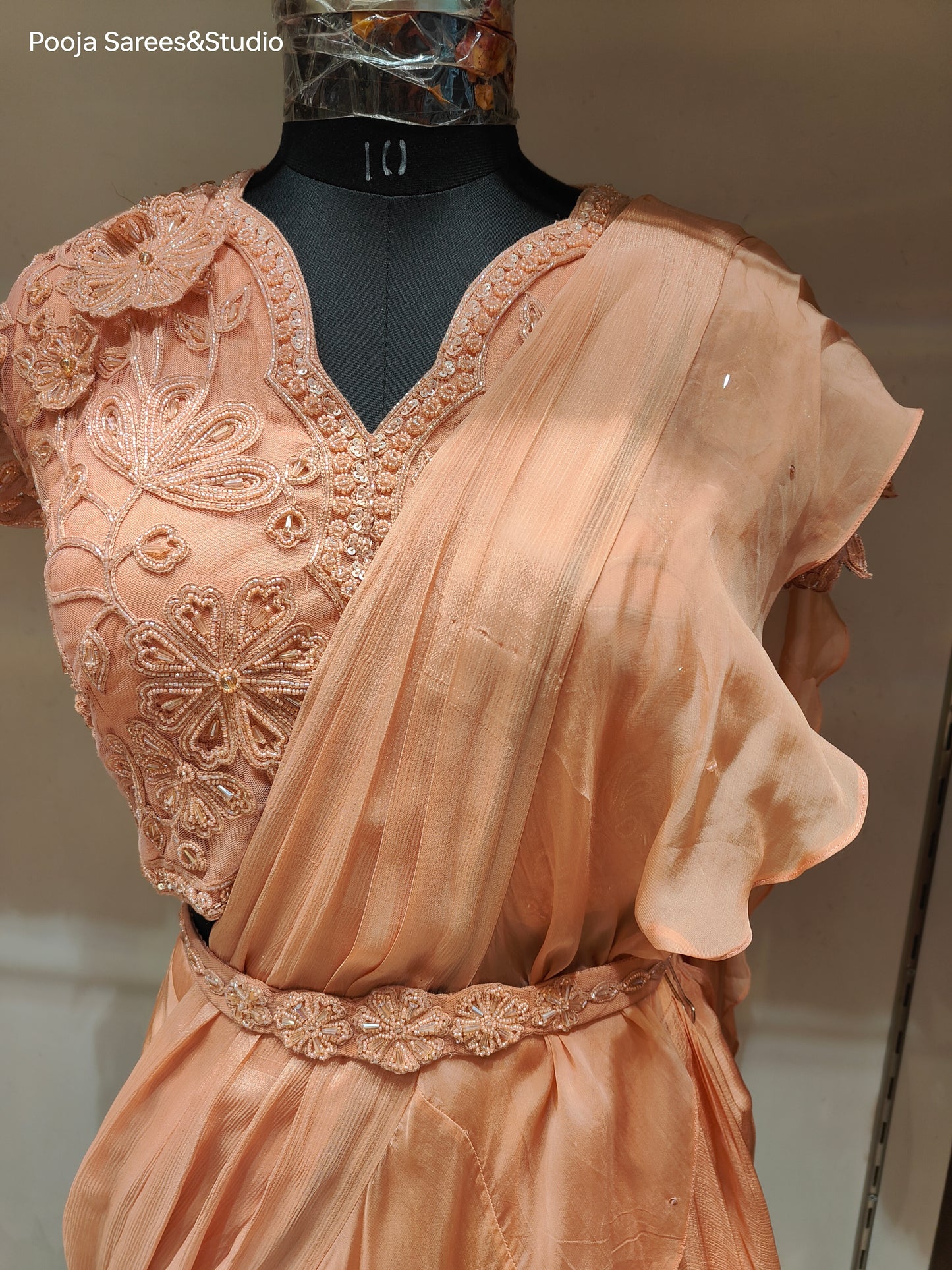 AARSAA Peach Crepe Katdana Flower Motif Work Blouse with Fishcut Lehenga Drape