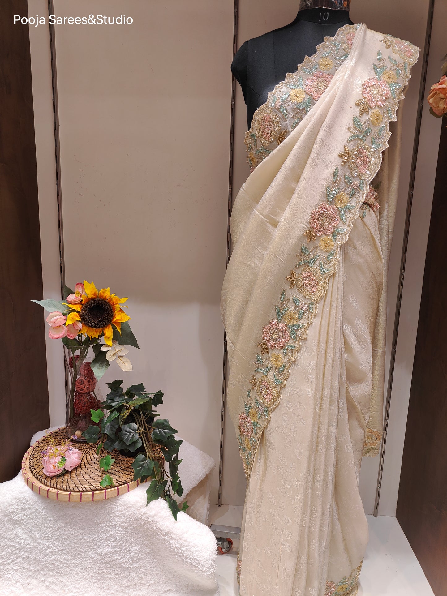 AARSAA Cream Self Jacquard Silk Saree with multicolour sequence work border and unstitched blouse