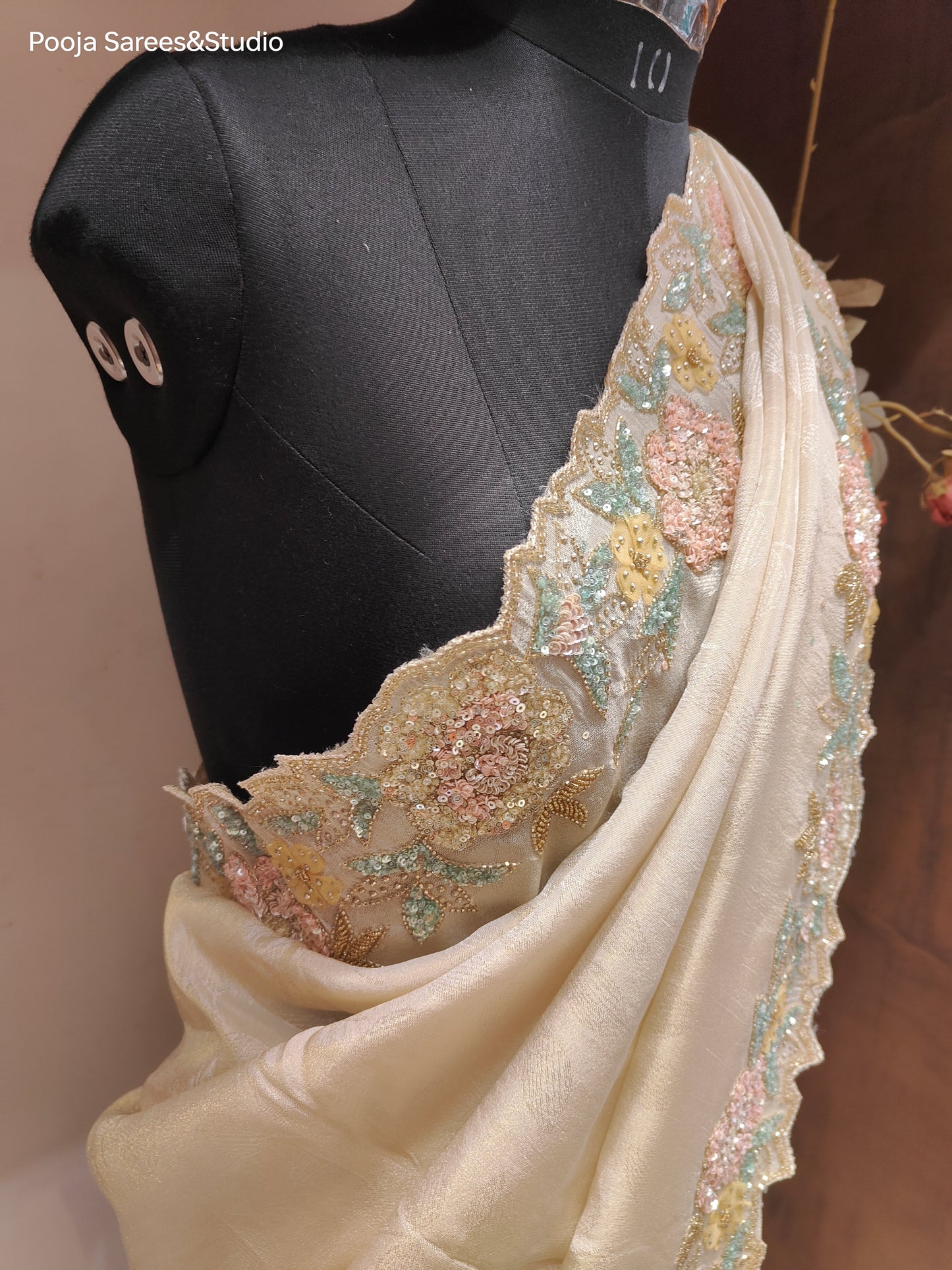 AARSAA Cream Self Jacquard Silk Saree with multicolour sequence work border and unstitched blouse